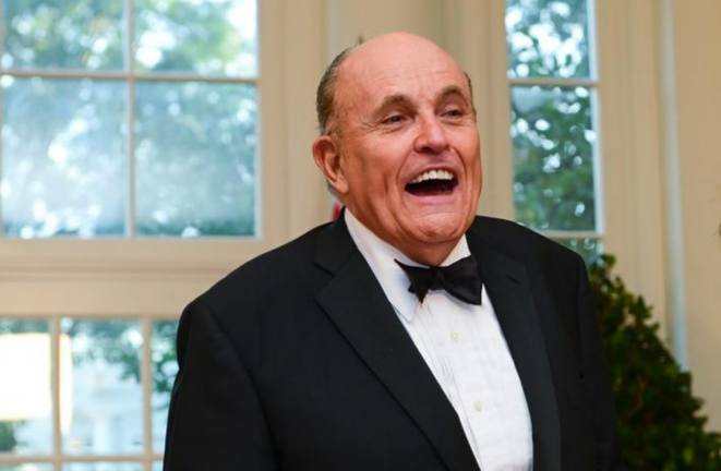 L'avocat et ami de Trump Rudy Giuliani, ancien maire de New York, lors d'un dîner à la Maison Blanche le 20 septembre. © Reuters
